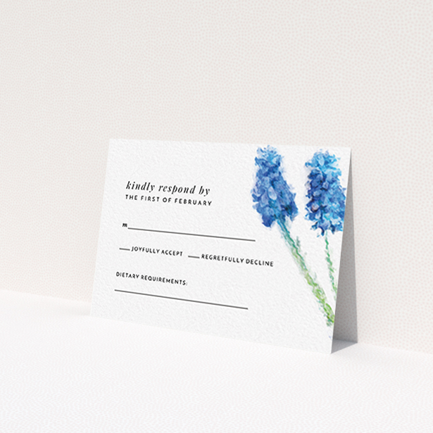 A wedding rsvp card design named "A new bloom". It is an A7 card in a landscape orientation. "A new bloom" is available as a flat card, with tones of blue and white.