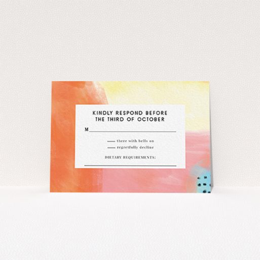 A wedding rsvp card design named "Abstract Colours". It is an A7 card in a landscape orientation. "Abstract Colours" is available as a flat card, with tones of orange, red and yellow.