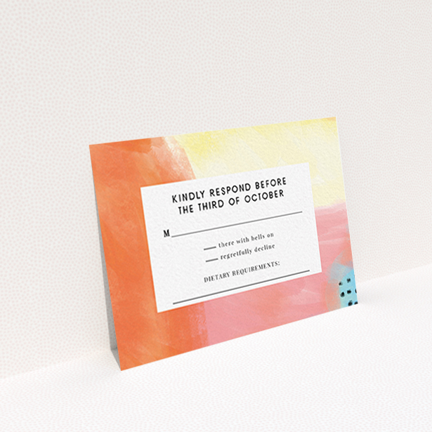 A wedding rsvp card design named "Abstract Colours". It is an A7 card in a landscape orientation. "Abstract Colours" is available as a flat card, with tones of orange, red and yellow.