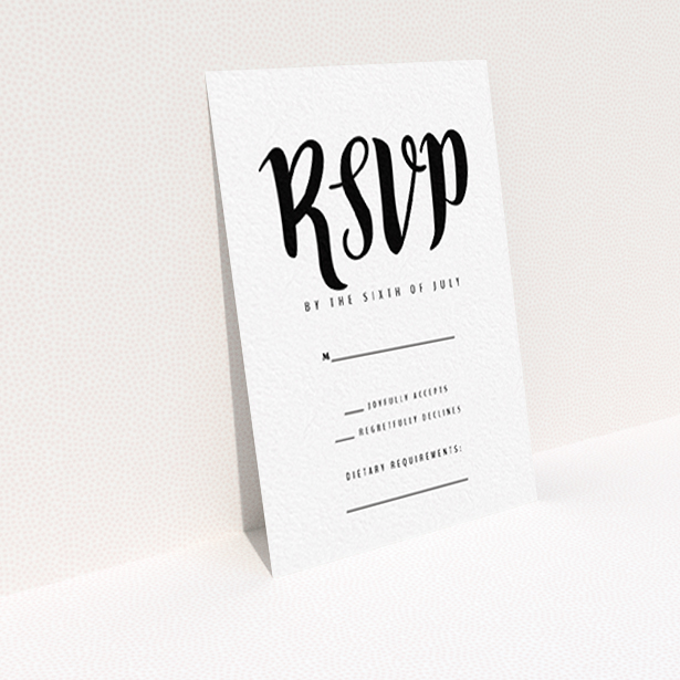 A wedding rsvp card template titled "Black Typography". It is an A7 card in a portrait orientation. "Black Typography" is available as a flat card, with tones of black and white.