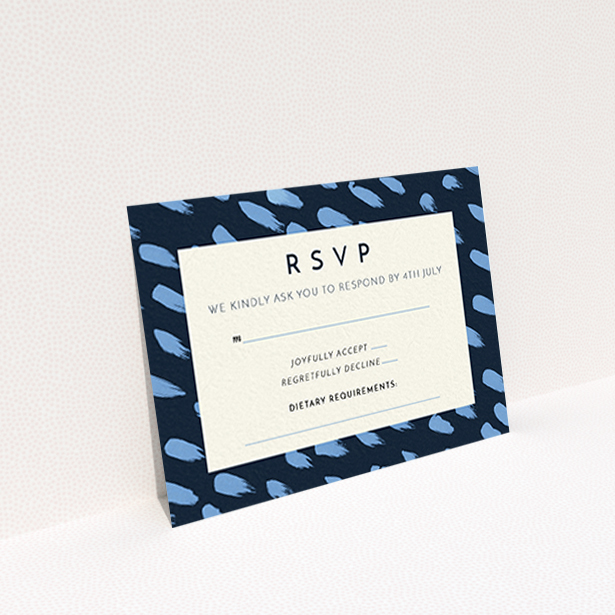 A wedding rsvp card design named "Blue strokes". It is an A7 card in a landscape orientation. "Blue strokes" is available as a flat card, with tones of dark blue and light blue.