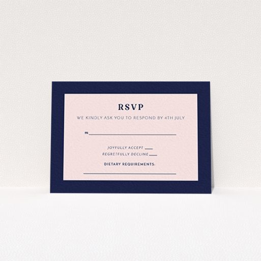 A wedding rsvp card called "Bold border". It is an A7 card in a landscape orientation. "Bold border" is available as a flat card, with tones of navy blue and pink.