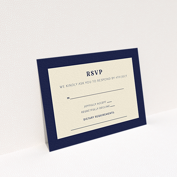 A wedding rsvp card design titled "Bold border". It is an A7 card in a landscape orientation. "Bold border" is available as a flat card, with tones of cream and navy blue.