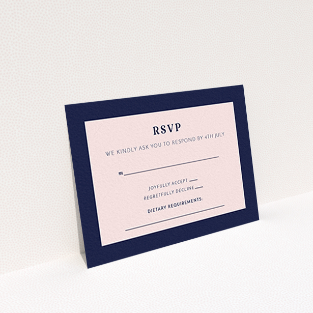 A wedding rsvp card called "Bold border". It is an A7 card in a landscape orientation. "Bold border" is available as a flat card, with tones of navy blue and pink.