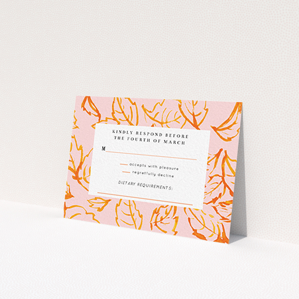 A wedding rsvp card design titled "Falling Foliage". It is an A7 card in a landscape orientation. "Falling Foliage" is available as a flat card, with tones of pink, orange and white.