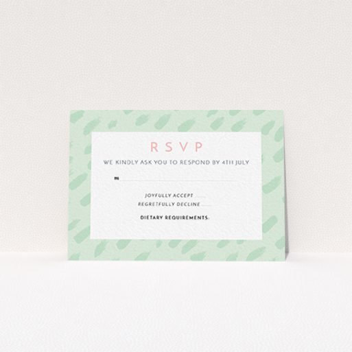 A wedding rsvp card design called "Green Strokes". It is an A7 card in a landscape orientation. "Green Strokes" is available as a flat card, with tones of green and white.