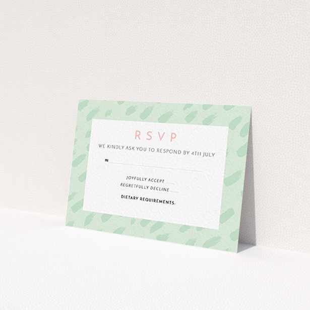 A wedding rsvp card design called 'Green Strokes'. It is an A7 card in a landscape orientation. 'Green Strokes' is available as a flat card, with tones of green and white.