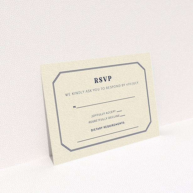A wedding rsvp card design named "In between the lines square". It is an A7 card in a landscape orientation. "In between the lines square" is available as a flat card, with tones of cream and navy blue.