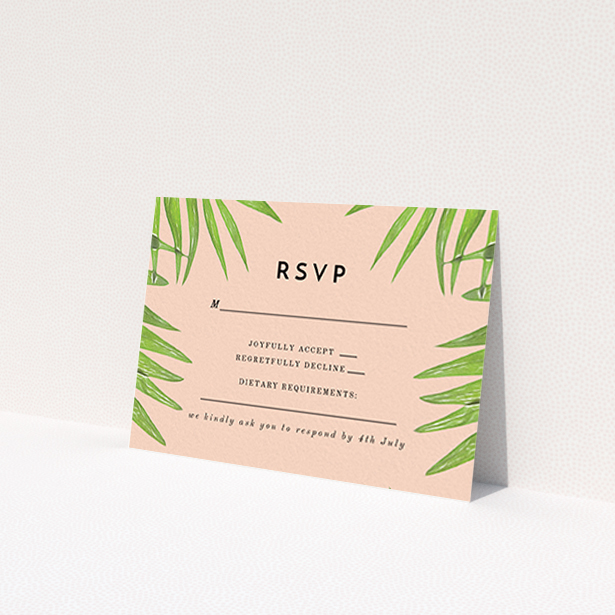 A wedding rsvp card design titled "In the courtyard". It is an A7 card in a landscape orientation. "In the courtyard" is available as a flat card, with tones of green and pink.