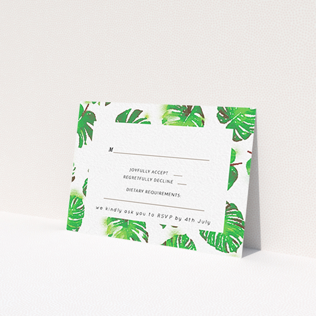 A wedding rsvp card design titled 'Jungle Sky'. It is an A7 card in a landscape orientation. 'Jungle Sky' is available as a flat card, with tones of green and white.