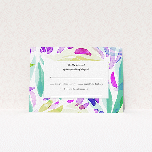 A wedding rsvp card design called "Neon Florals". It is an A7 card in a landscape orientation. "Neon Florals" is available as a flat card, with tones of white, green and pink.