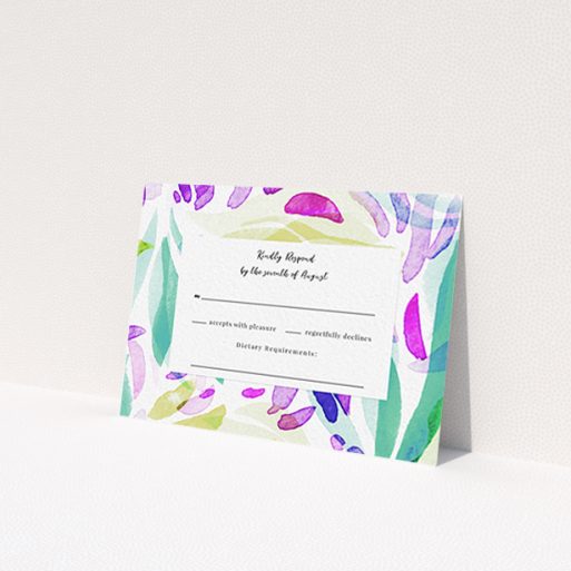 A wedding rsvp card design called 'Neon Florals'. It is an A7 card in a landscape orientation. 'Neon Florals' is available as a flat card, with tones of white, green and pink.