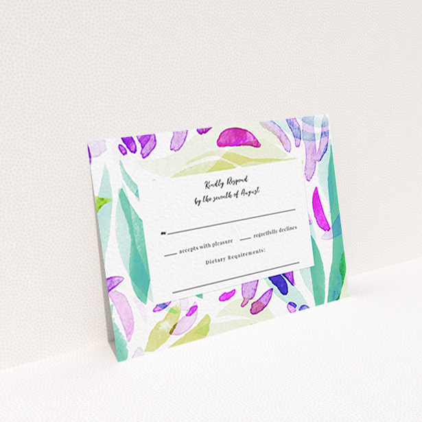 A wedding rsvp card design called "Neon Florals". It is an A7 card in a landscape orientation. "Neon Florals" is available as a flat card, with tones of white, green and pink.