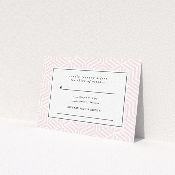 A wedding rsvp card template titled 'Pink geometric maze'. It is an A7 card in a landscape orientation. 'Pink geometric maze' is available as a flat card, with tones of pink and white.