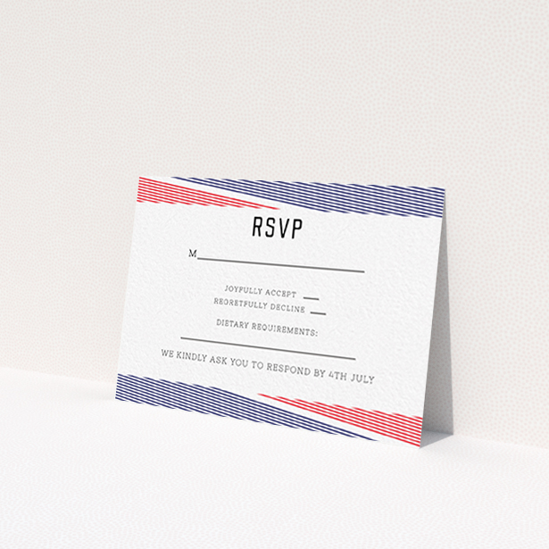 A wedding rsvp card design named "Preppy Lines". It is an A7 card in a landscape orientation. "Preppy Lines" is available as a flat card, with tones of red and blue.