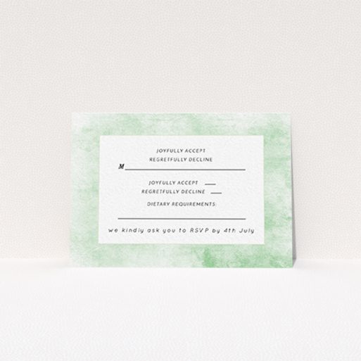 A wedding rsvp card named "Rustic Green". It is an A7 card in a landscape orientation. "Rustic Green" is available as a flat card, with tones of green and white.