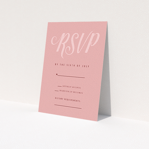 A wedding rsvp card design called "Slant Typography Pastel pink". It is an A7 card in a portrait orientation. "Slant Typography Pastel pink" is available as a flat card, with mainly pink colouring.