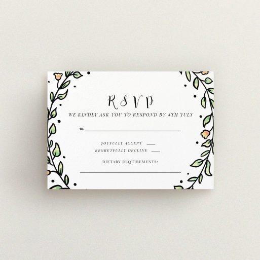 A wedding rsvp card design called "Wreath Outline". It is an A7 card in a landscape orientation. "Wreath Outline" is available as a flat card, with tones of green, red and yellow.