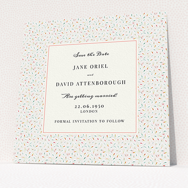 A wedding save the date card named "A hint of confetti". It is a square (148mm x 148mm) card in a square orientation. "A hint of confetti" is available as a flat card, with tones of light cream and green.
