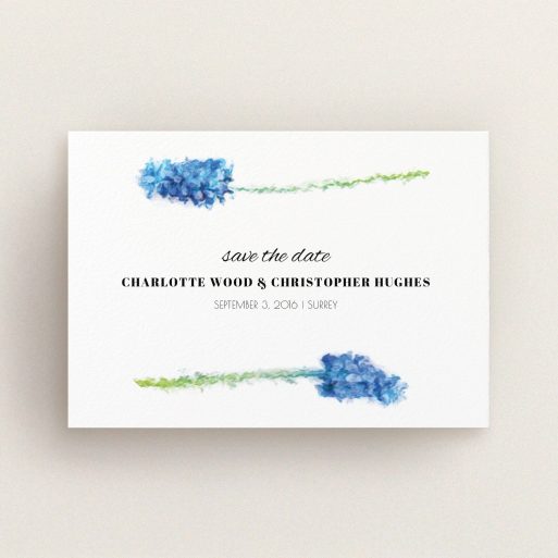 A wedding save the date card called "A new bloom". It is an A6 card in a landscape orientation. "A new bloom" is available as a flat card, with tones of blue and white.