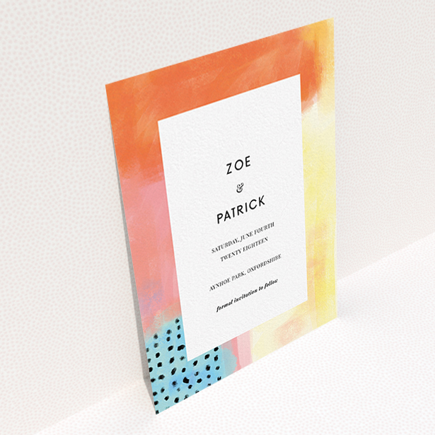 A wedding save the date card called "Abstract Colours". It is an A6 card in a portrait orientation. "Abstract Colours" is available as a flat card, with tones of orange, red and yellow.