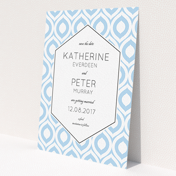 A wedding save the date card named 'Arabian diamonds'. It is an A6 card in a portrait orientation. 'Arabian diamonds' is available as a flat card, with tones of blue and white.