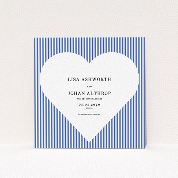 A wedding save the date card called "Between the Lines". It is a square (148mm x 148mm) card in a square orientation. "Between the Lines" is available as a flat card, with tones of blue and white.