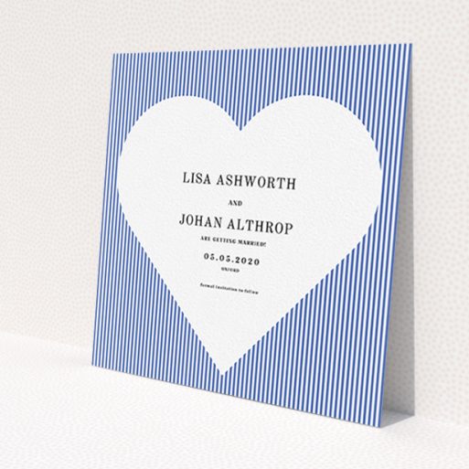 A wedding save the date card called 'Between the Lines'. It is a square (148mm x 148mm) card in a square orientation. 'Between the Lines' is available as a flat card, with tones of blue and white.