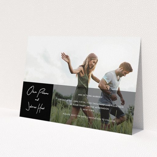 A wedding save the date card design called 'Black on black'. It is an A5 card in a landscape orientation. It is a photographic wedding save the date card with room for 1 photo. 'Black on black' is available as a flat card, with tones of black and white.