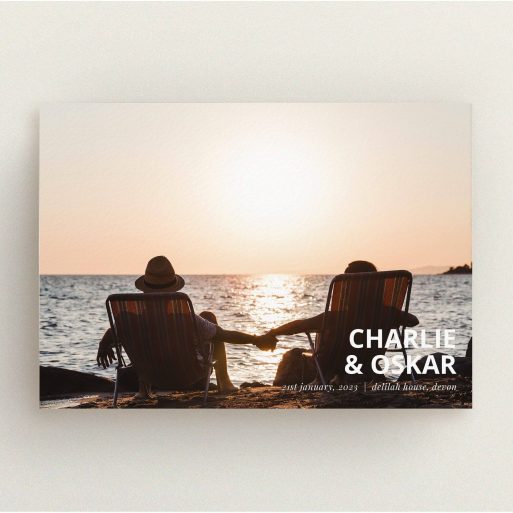 A wedding save the date card design titled "Bold Corner Photo". It is an A5 card in a landscape orientation. It is a photographic wedding save the date card with room for 1 photo. "Bold Corner Photo" is available as a flat card, with mainly white colouring.