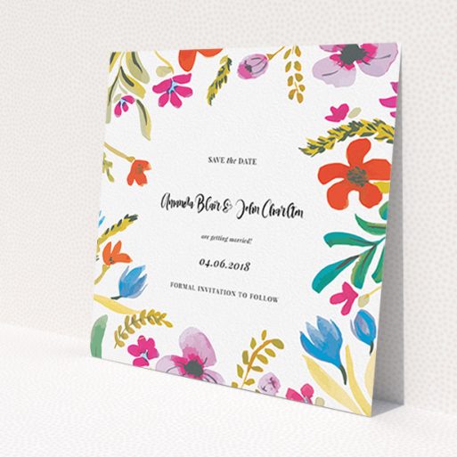 A wedding save the date card named 'Botanical Pop'. It is a square (148mm x 148mm) card in a square orientation. 'Botanical Pop' is available as a flat card, with tones of white and red.