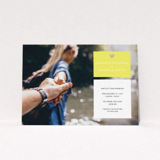 A wedding save the date card design named "Boxed In". It is an A5 card in a landscape orientation. It is a photographic wedding save the date card with room for 1 photo. "Boxed In" is available as a flat card, with mainly yellow colouring.
