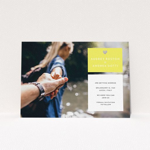 A wedding save the date card template titled "Boxed In". It is an A6 card in a landscape orientation. It is a photographic wedding save the date card with room for 1 photo. "Boxed In" is available as a flat card, with mainly yellow colouring.