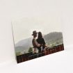 A wedding save the date card named "Central Script". It is an A5 card in a landscape orientation. It is a photographic wedding save the date card with room for 1 photo. "Central Script" is available as a flat card, with mainly white colouring.