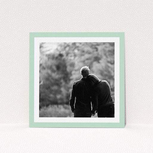 A wedding save the date card called "Classic Mint Photo Frame". It is a square (148mm x 148mm) card in a square orientation. It is a photographic wedding save the date card with room for 1 photo. "Classic Mint Photo Frame" is available as a flat card, with tones of green and white.