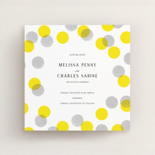 A wedding save the date card called "Cork Stamps". It is a square (148mm x 148mm) card in a square orientation. "Cork Stamps" is available as a flat card, with tones of white and yellow.