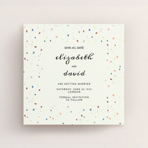 Wedding Save The Date Card Design - "Crayon splinters" A wedding save the date card called "Crayon splinters". It is a square (148mm x 148mm) card in a square orientation. "Crayon splinters" is available as a flat card, with tones of pale cream and orange.
