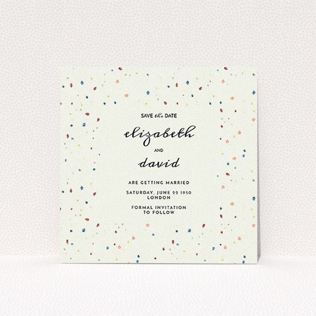 A wedding save the date card called "Crayon splinters". It is a square (148mm x 148mm) card in a square orientation. "Crayon splinters" is available as a flat card, with tones of pale cream and orange.