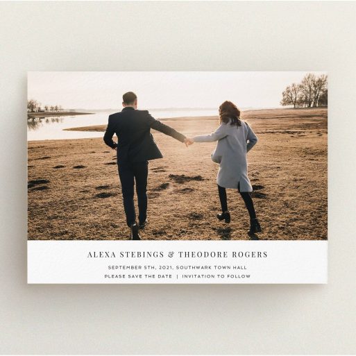 A wedding save the date card design titled "Duke of York Square". It is an A5 card in a landscape orientation. It is a photographic wedding save the date card with room for 1 photo. "Duke of York Square" is available as a flat card, with mainly white colouring.