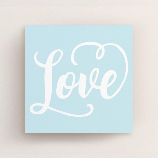 A wedding save the date card called "Folded Typography". It is a square (148mm x 148mm) card in a square orientation. "Folded Typography" is available as a flat card, with tones of blue and white.