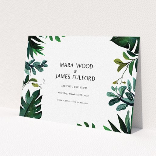 A wedding save the date card called 'Gap in the Jungle'. It is an A6 card in a landscape orientation. 'Gap in the Jungle' is available as a flat card, with tones of blue and green.
