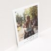 A wedding save the date card template titled "Hoxton Square". It is an A5 card in a portrait orientation. It is a photographic wedding save the date card with room for 1 photo. "Hoxton Square" is available as a flat card, with mainly white colouring.