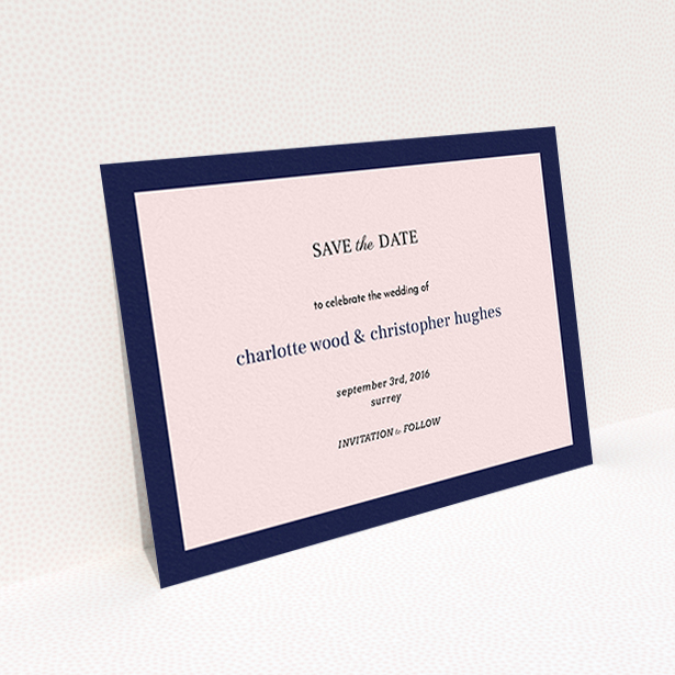 A wedding save the date card design named "Laydown simple". It is an A6 card in a landscape orientation. "Laydown simple" is available as a flat card, with tones of pink and navy blue.