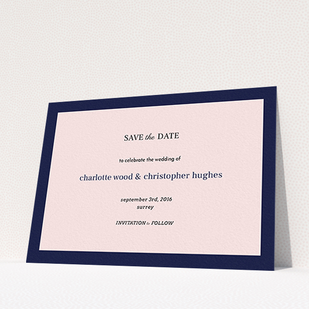 A wedding save the date card design named "Laydown simple". It is an A6 card in a landscape orientation. "Laydown simple" is available as a flat card, with tones of pink and navy blue.