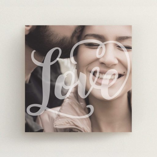 A wedding save the date card template titled "Light Typography". It is a square (148mm x 148mm) card in a square orientation. It is a photographic wedding save the date card with room for 1 photo. "Light Typography" is available as a flat card, with mainly white colouring.