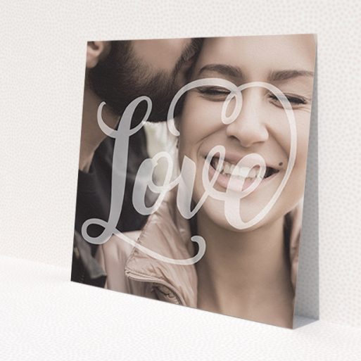 A wedding save the date card template titled 'Light Typography'. It is a square (148mm x 148mm) card in a square orientation. It is a photographic wedding save the date card with room for 1 photo. 'Light Typography' is available as a flat card, with mainly white colouring.