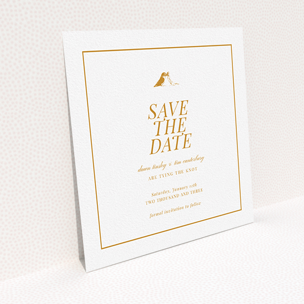 A wedding save the date card called "Lovebirds". It is a square (148mm x 148mm) card in a square orientation. "Lovebirds" is available as a flat card, with tones of white and orange.