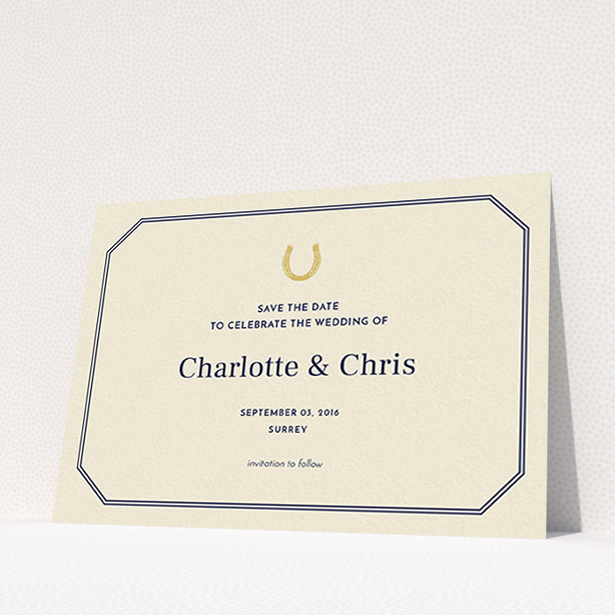 A wedding save the date card design called "Lucky horse shoe". It is an A6 card in a landscape orientation. "Lucky horse shoe" is available as a flat card, with tones of cream and gold.