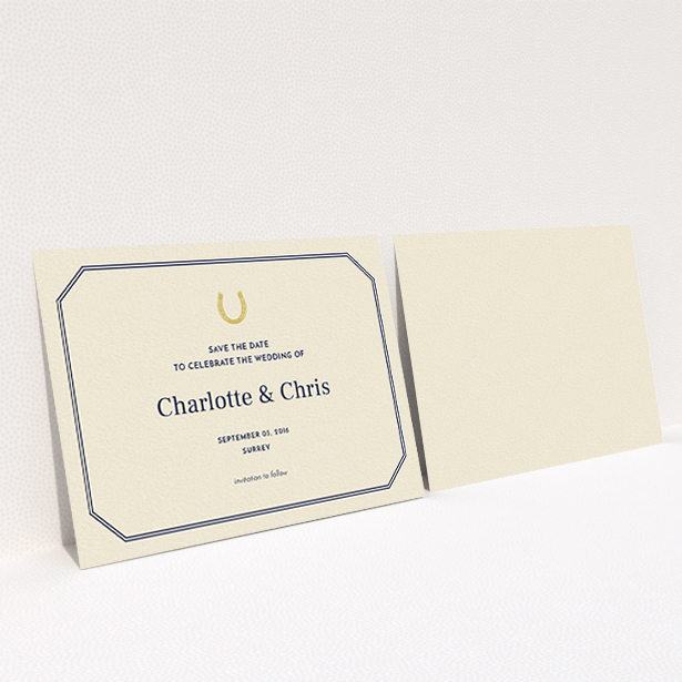 A wedding save the date card design called "Lucky horse shoe". It is an A6 card in a landscape orientation. "Lucky horse shoe" is available as a flat card, with tones of cream and gold.