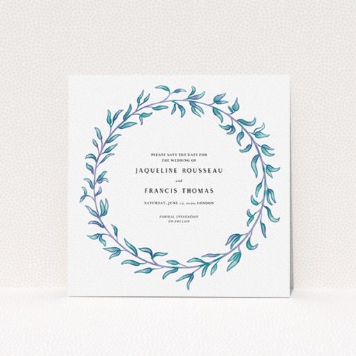 A wedding save the date card named "Marine Wreath". It is a square (148mm x 148mm) card in a square orientation. "Marine Wreath" is available as a flat card, with tones of blue and green.